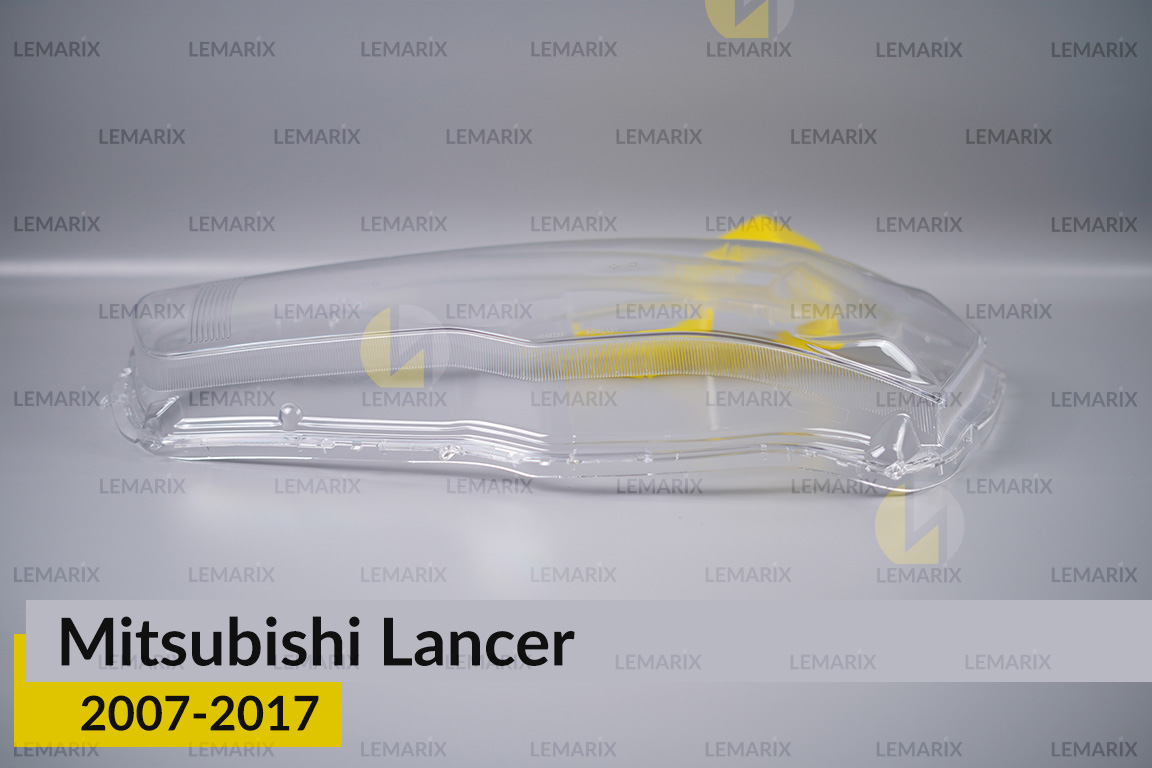 Скло фари Mitsubishi Lancer (2007-2017) ліве