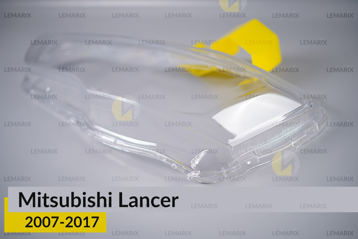 Скло фари Mitsubishi Lancer (2007-2017) ліве