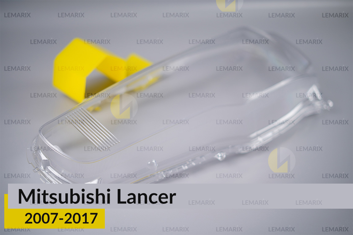 Скло фари Mitsubishi Lancer (2007-2017) ліве